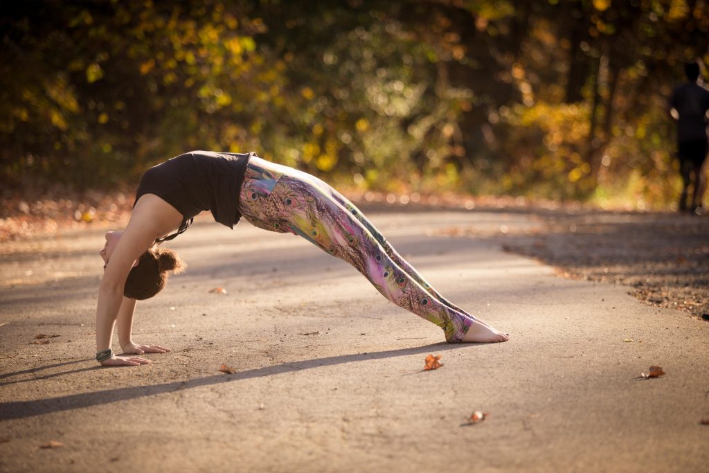 Bridget in a yoga pose. All proceeds benefit New Hope Ministries and the India/Nepal One Red Bead Initiative