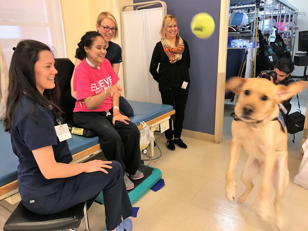 Spinal cord injury patient, Elizabeth Gomez learning to move forward and sit back 